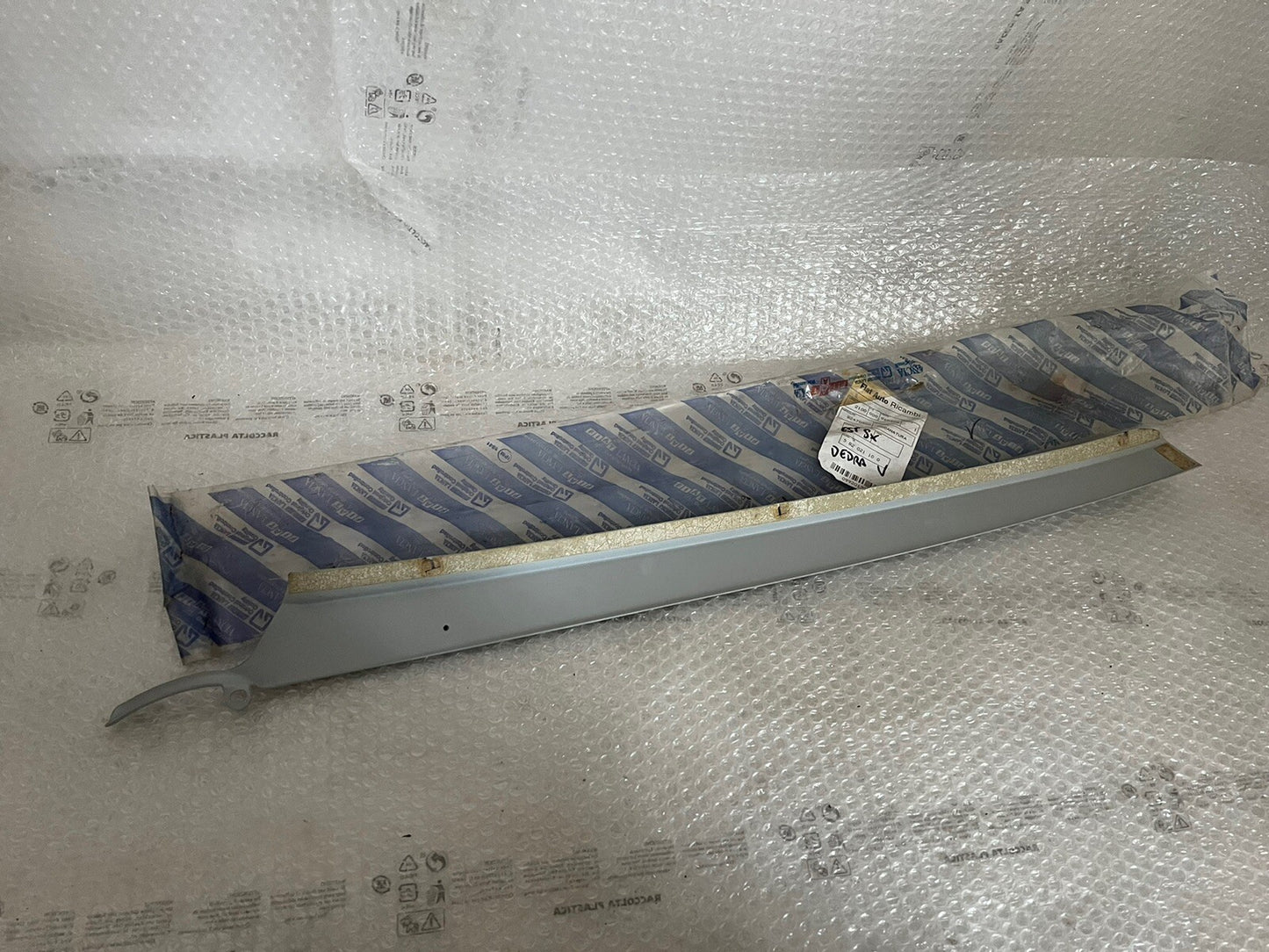 6996027