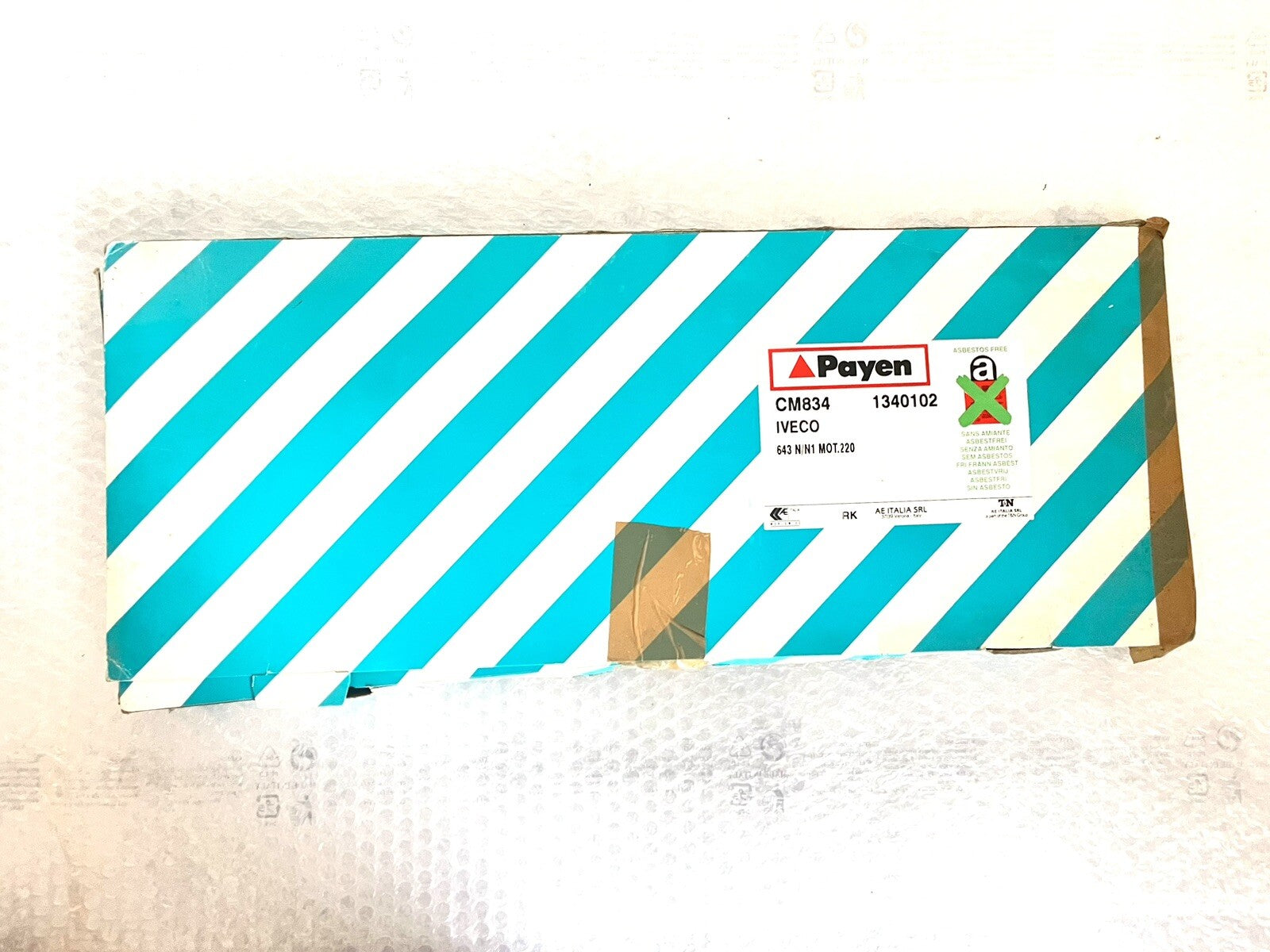 6994883