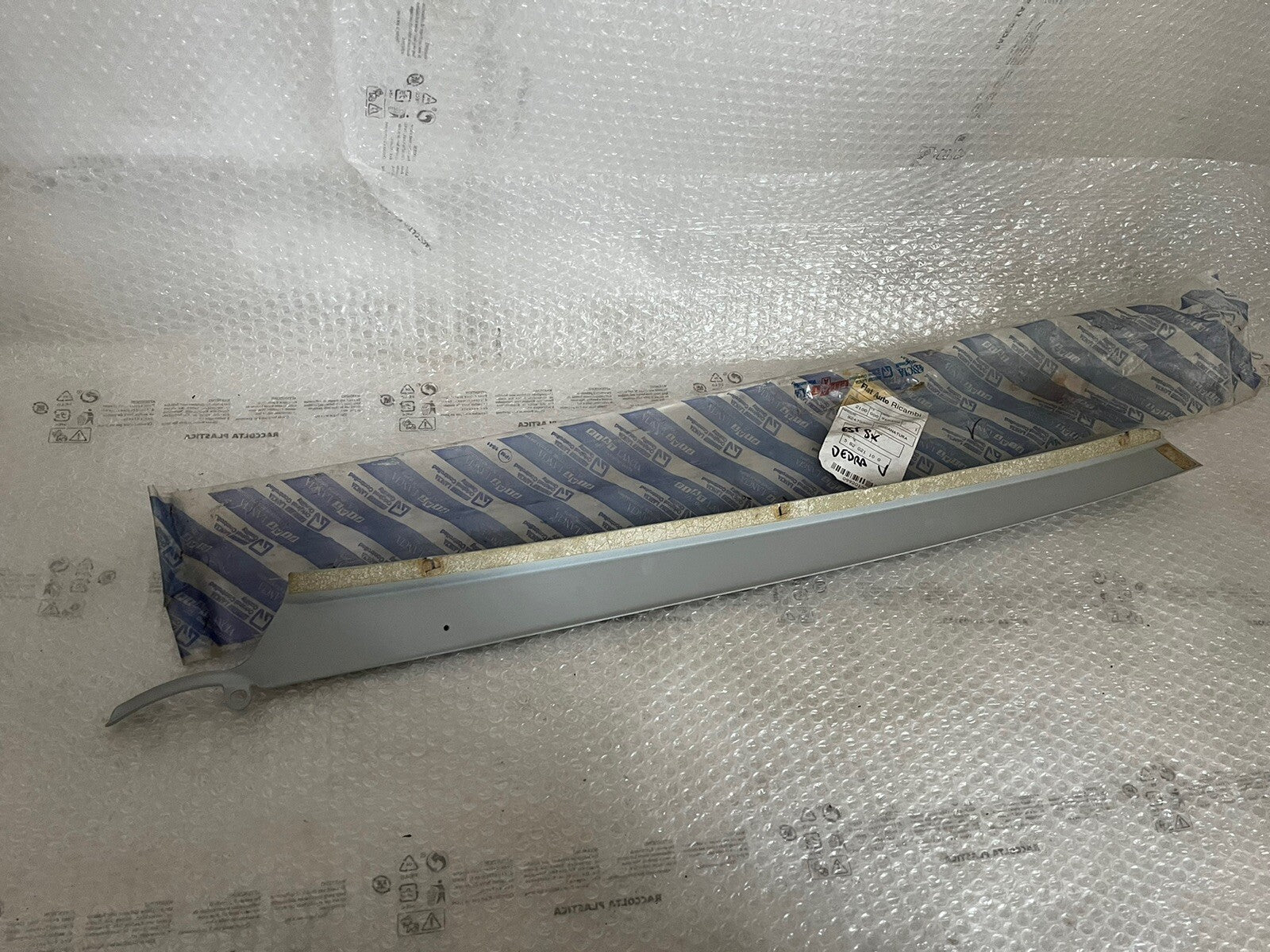 6996027