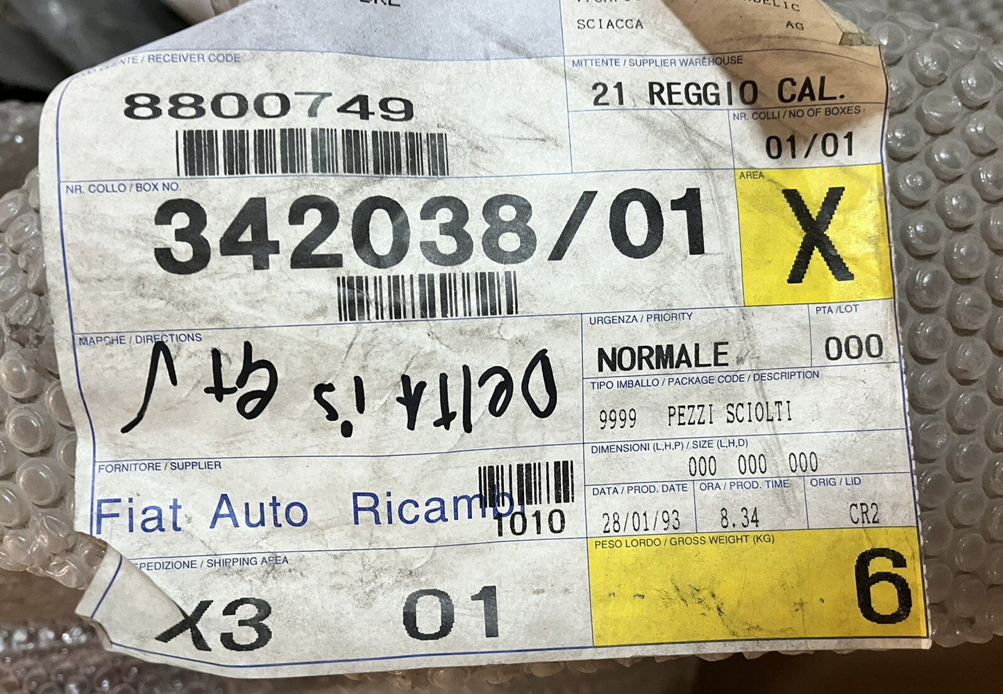 6995561
