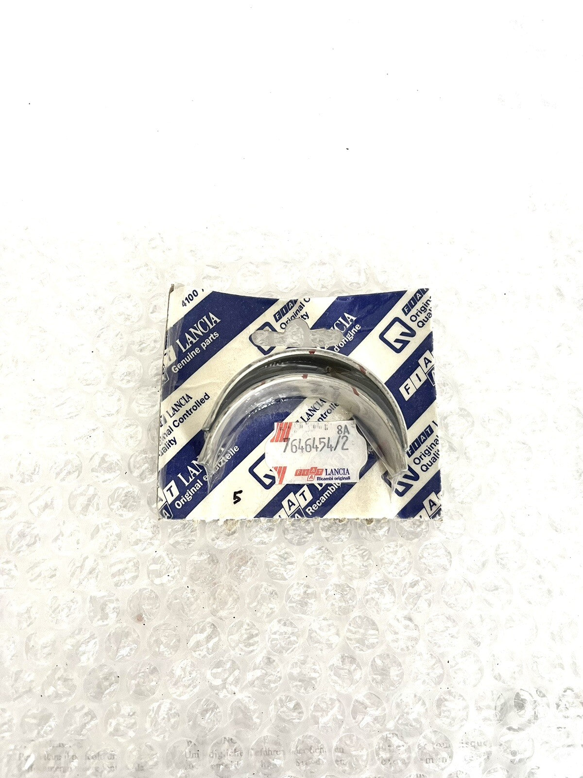 6996493