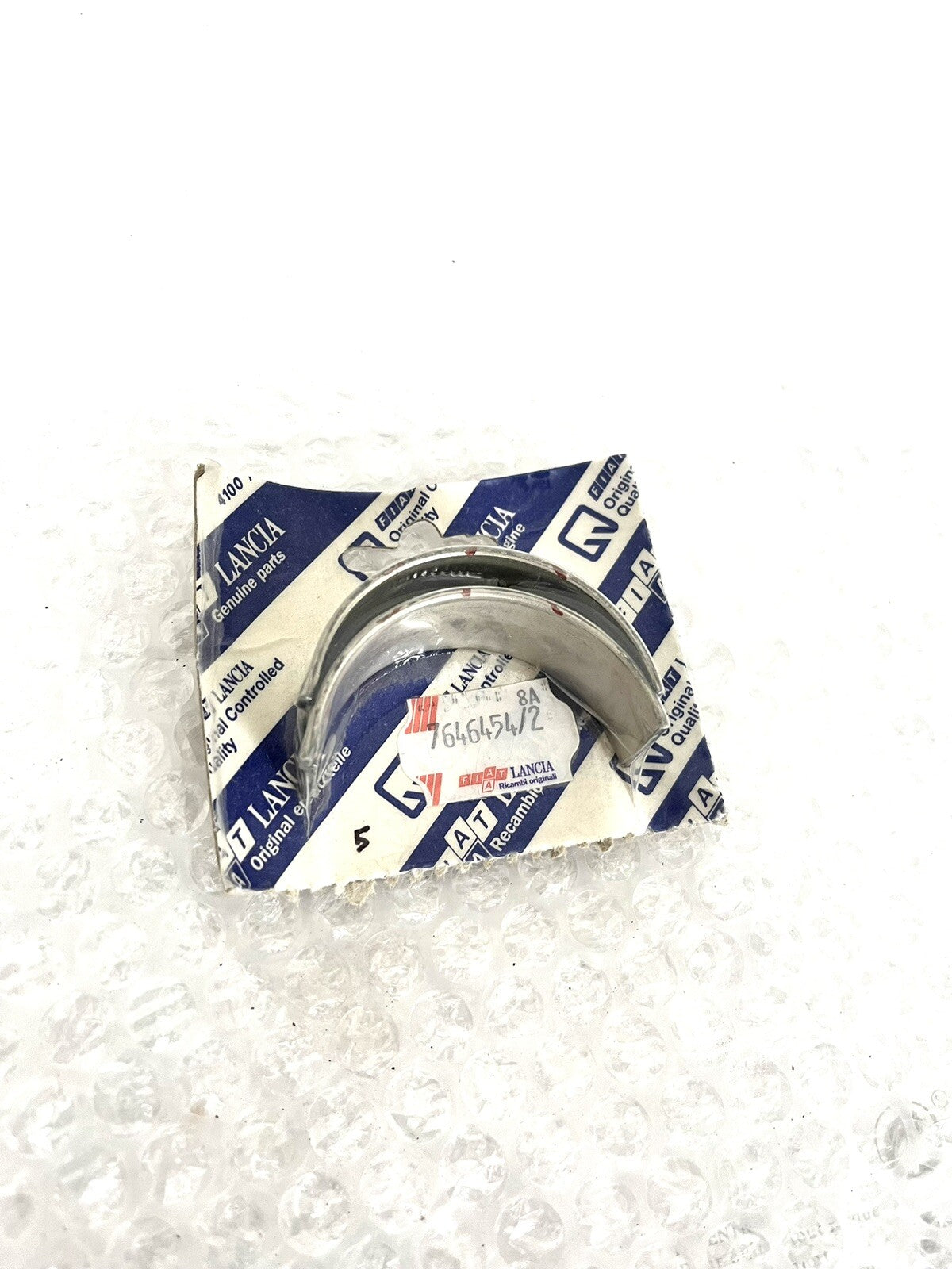 6996493